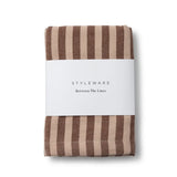Between The Lines Tea Towel - Choc Malt