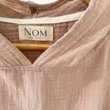 NOM the label | Poncho