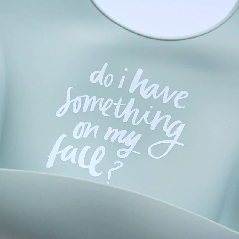 The Somewhere Co | Something On My Face (Sage) Silicone Baby Bib